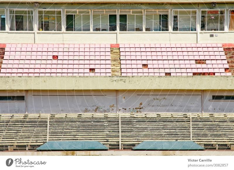 An old abandoned football stadium in Uruguay Sporting Complex Football pitch Stadium Architecture Historic Decadence Loneliness Elegant End Past Colour photo