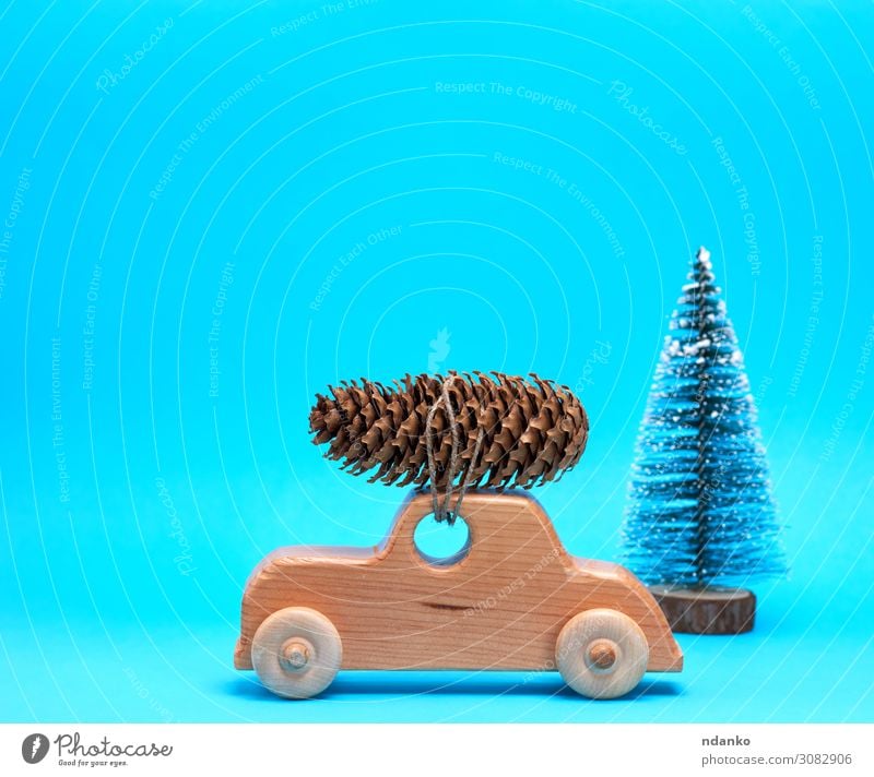 wooden toy car carries on top a pine cone Winter Decoration Feasts & Celebrations Christmas & Advent New Year's Eve Tree Transport Car Toys Wood Movement Retro
