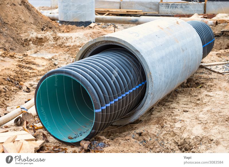 Big pipe or tube for water sewer Work and employment Profession Industry Services Construction site Telecommunications Tool Industrial plant Factory Tunnel