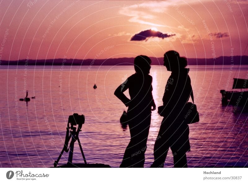 Kitsch in the evening Dusk Photography Tripod Clouds False Ocean Woman Man Couple Sun In pairs