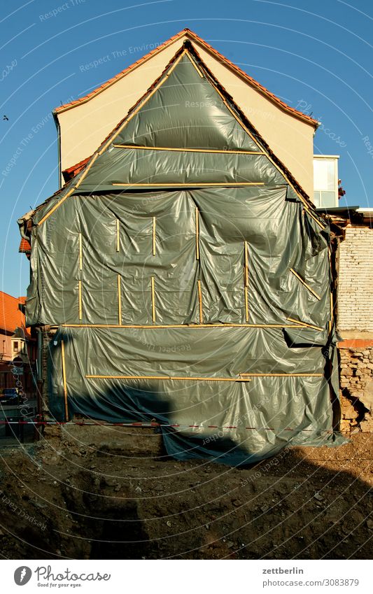 excavation aschersleben Old town Detail House (Residential Structure) Facade Gable Construction site Building lot Covers (Construction) Insulation Protection