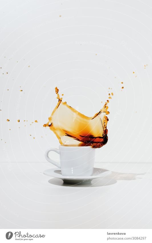 White cup and saucer with splashing coffee Minimalistic Movement Espresso Cup Mug Saucer Tea Aromatic Black Coffee Splash Beverage Fluid Liquid Hot