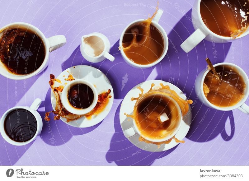 various cups with coffee and creamer on purple Cup Mug dishware Sweet Spoon Cappuccino Sugar latte flatlay Espresso Black Hot Splashing Beverage Tasty Dessert