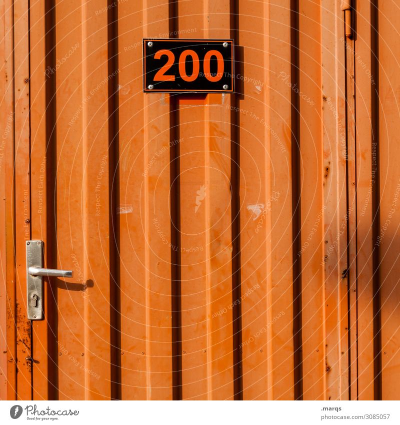 200 Construction site Door Site trailer Metal Digits and numbers Signs and labeling Orange Black Arrangement Colour photo Exterior shot Deserted