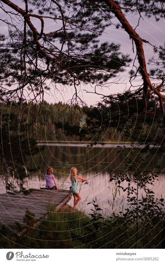 Girls fishing in the evening light Harmonious Relaxation Calm Leisure and hobbies Playing Fishing (Angle) Vacation & Travel Tourism Adventure Summer Island