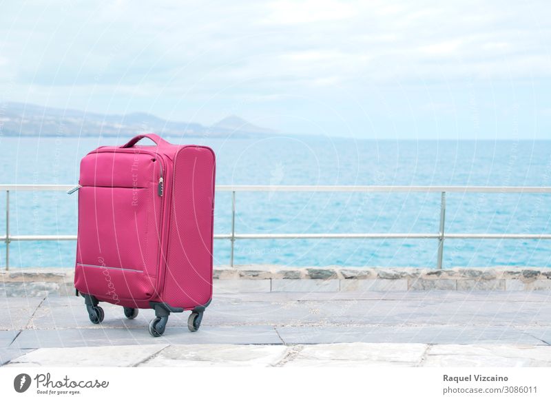 Red travel suitcase Lifestyle Vacation & Travel Tourism Trip Sightseeing Ocean Horizon Suitcase To enjoy Blue White Adventure Discover Far-off places Target
