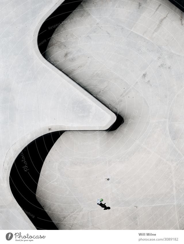 Person Standing in the Middle of a Skate Park from Above Drone Skate park Aircraft Skateboarding Inline skating Board Shadow Structures and shapes Minimal