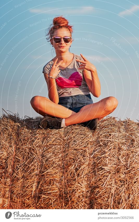 A pretty girl in the countryside - a Royalty Free Stock Photo from Photocase