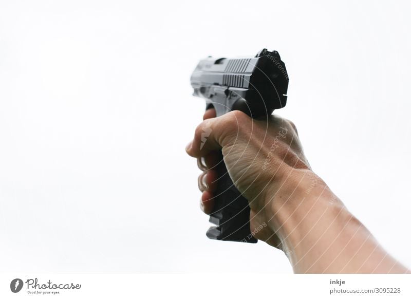 pistol Lifestyle Shoot Youth (Young adults) Adults Hand 1 Human being Weapon Handgun air pistol To hold on Threat Target Force Aim Colour photo Exterior shot