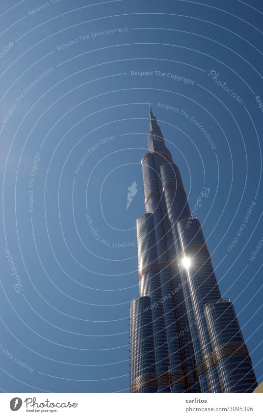Burj Khalifa with sun Dubai United Arab Emirates Capital city City High-rise Economic growth Construction boom
