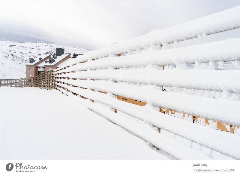 Winter mountains landscape with snowed fence in Sierra Nevada Beautiful Vacation & Travel Tourism Snow Mountain Nature Landscape Sky Clouds Weather Forest Wood