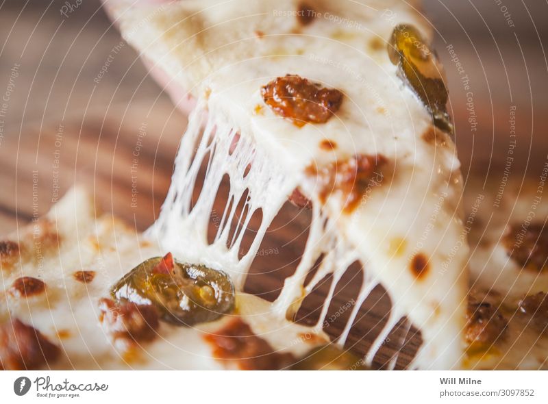 Slice of Pizza with Cheese Pull Stretching Dairy Food Dish Food photograph Meat Pepper Lunch Dinner Italian Delicious Gourmet