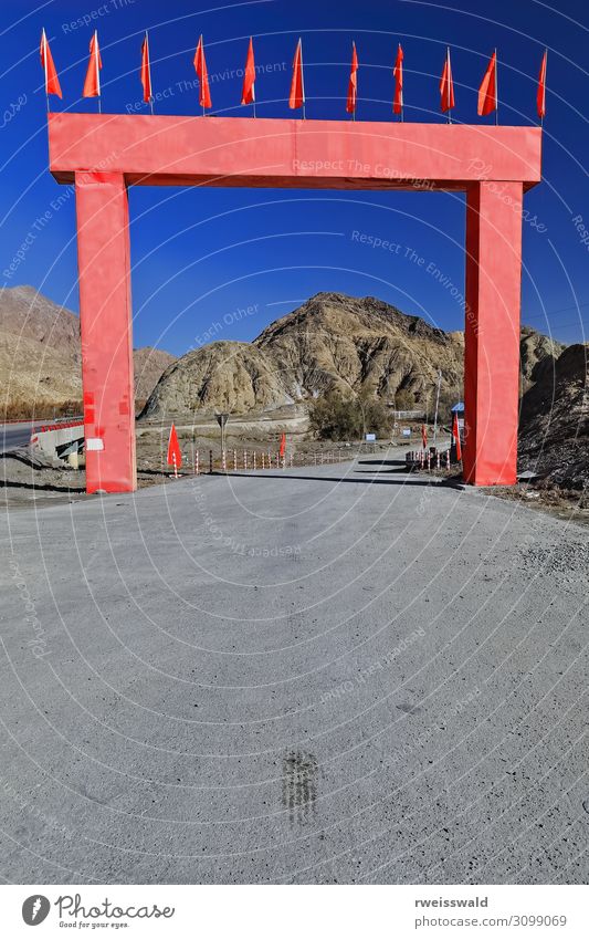 Red arch-road upkeep facility-Nnal.Hwy.G315. Xinjiang-China-0497 Vacation & Travel Tourism Trip Sightseeing Sun Mountain Work and employment Workplace