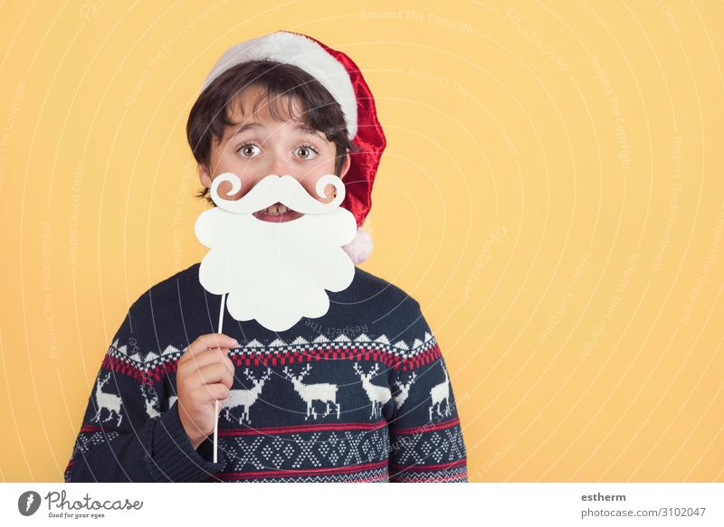 Child Wearing Christmas Santa Claus Hat and beard on yellow background Lifestyle Joy Winter Feasts & Celebrations Christmas & Advent New Year's Eve Human being