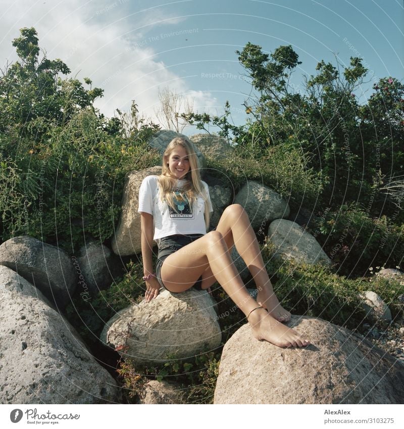 Young, lanky woman on a rocky dune Style already Wellness Life Summer Summer vacation Sun Analog Medium format Young woman Youth (Young adults) Legs