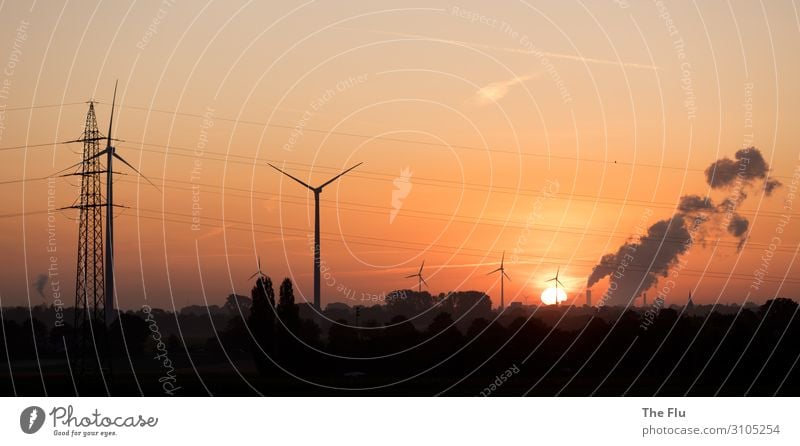 Sunrise in times of climate change Economy Industry Energy industry Technology Renewable energy Solar Power Wind energy plant Coal power station Energy crisis