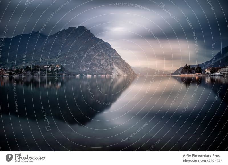 The mountains around Lecco reflected on the lake Vacation & Travel Tourism Winter Mountain Culture Environment Nature Landscape Sky Clouds Fog Coast Lakeside