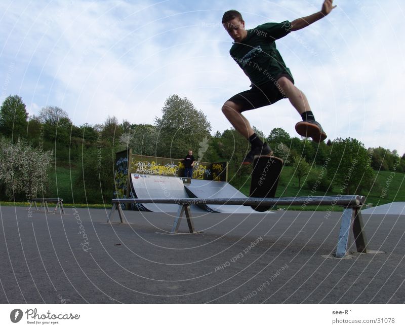 Skater @ Work Skateboarding Kickflip Air Jump Park Sports olive rail danger
