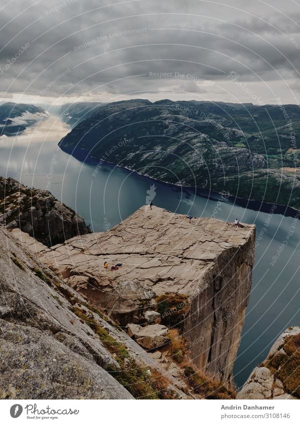 Preikestolen Norway nearly no people Environment Nature Landscape Water Sky Clouds Hill Rock Mountain Fjord Lake Think Relaxation Hiking Firm Large Infinity