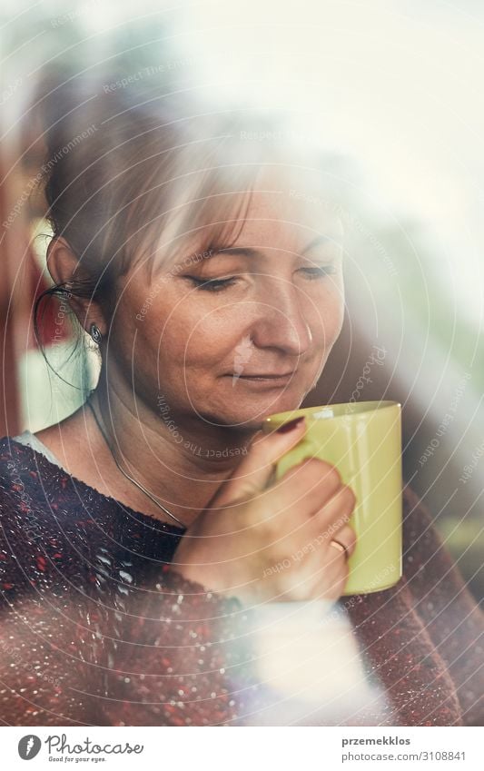 Portrait of woman drinking a coffee. Real people, authentic situations Drinking Coffee Tea Relaxation Human being Young woman Youth (Young adults) Woman Adults