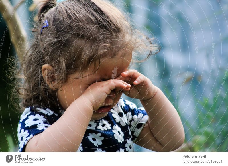 crying girl in a flowered dress Parenting Child Human being Feminine Toddler Infancy Head 1 3 - 8 years Dress brunette Long-haired Curl Sadness Cry Emotions