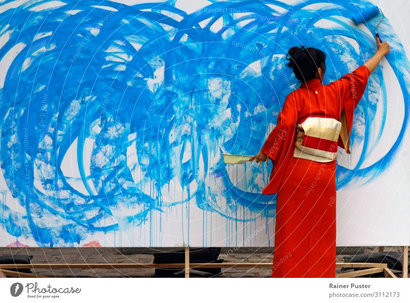 Woman in red kimono paints in blue Artist Feminine Adults Painter Work of art Kimono Black-haired Esthetic Blue Red Creativity creatively Inspiration