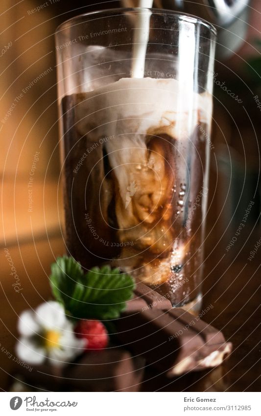 Pouring milk into chocolate espresso iced coffee Chocolate To have a coffee Beverage Cold drink Coffee Latte macchiato Espresso Glass Lifestyle Elegant Joy