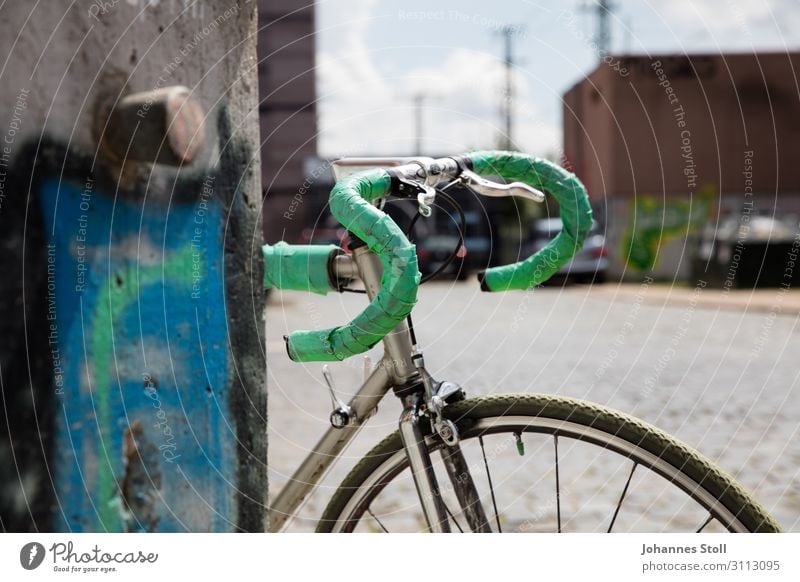 vintage racing bike leaning against wall in urban surrounding Lifestyle Design Cycling tour Sky Summer Town Factory Wall (barrier) Wall (building) Bicycle Stone