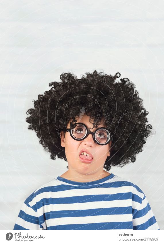 funny child making a grimace wearing nerd glasses Lifestyle Face Playing Human being Masculine Child Infancy 1 8 - 13 years Eyeglasses Wig Think Fitness Funny