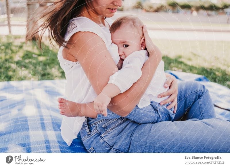 Little baby girl breast feeding. Stock Photo