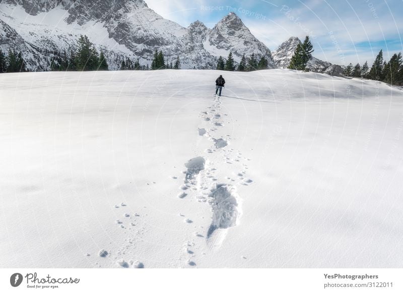 Snow footprints in the Alps mountains. Winter wandering scenery Adventure Mountain Hiking Christmas & Advent New Year's Eve Man Adults Nature Landscape
