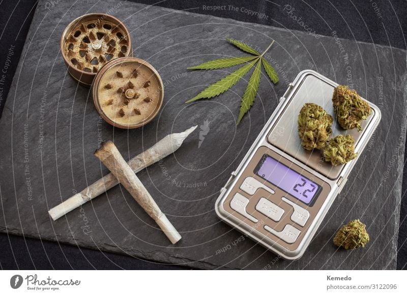 Marijuana joints ready to smoke and digital scale for weighing - a Royalty  Free Stock Photo from Photocase