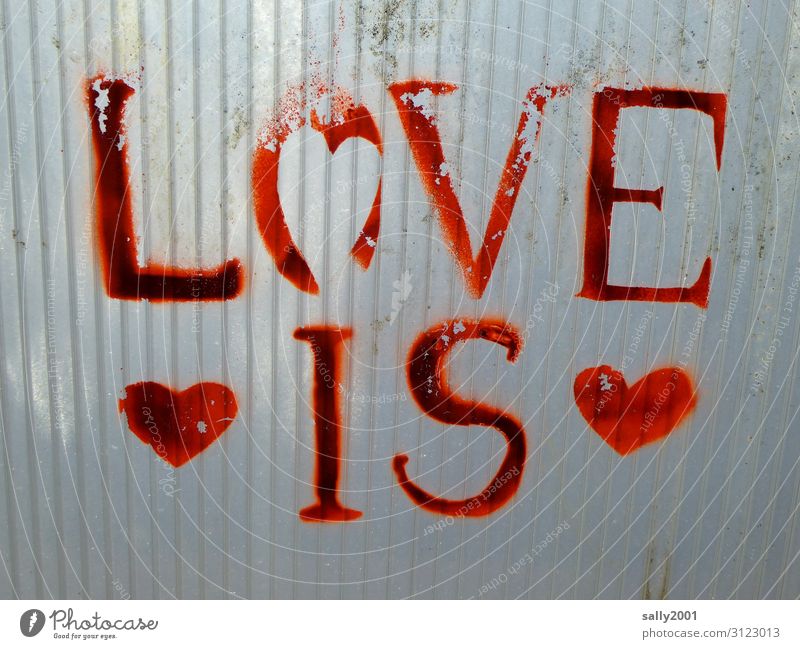 Love is... Sign Characters Graffiti Heart Positive Red Romance Apocalyptic sentiment Hope Display of affection Dirty Plastic Colour photo Exterior shot Deserted