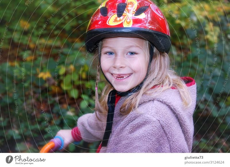 More fun with safety | girls with gaps in their teeth and bicycle helmet Playing Infancy 1 Human being 3 - 8 years Child Autumn Park Bicycle impeller Helmet