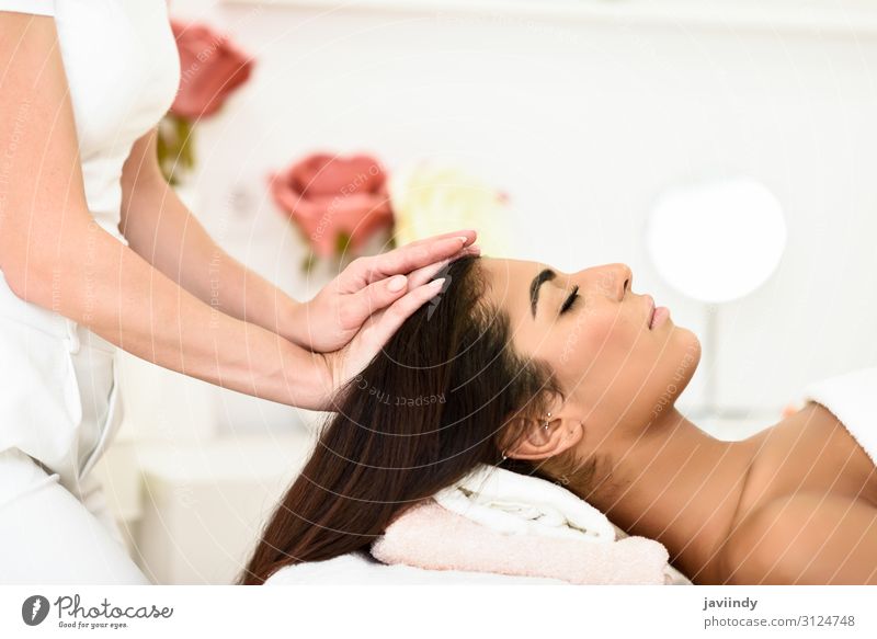 Woman receiving head massage in spa wellness center. Lifestyle Happy Beautiful Body Skin Face Health care Medical treatment Wellness Relaxation Spa Massage