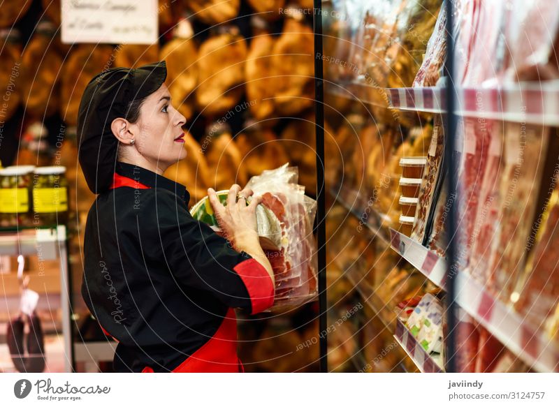 Portrait of female worker taking products in butcher shop Food Meat Cheese Shopping Work and employment Profession Business Human being Feminine Young woman