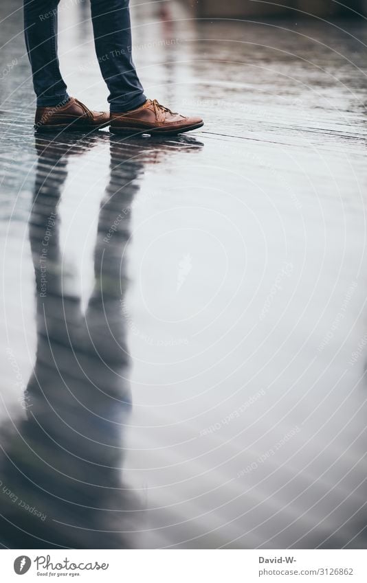 waiting Man reflection mirror Shadow Wet Rain Rainy weather Autumn Autumnal Reflection Colour photo Drops of water Exterior shot Water Damp Light Blur Footwear