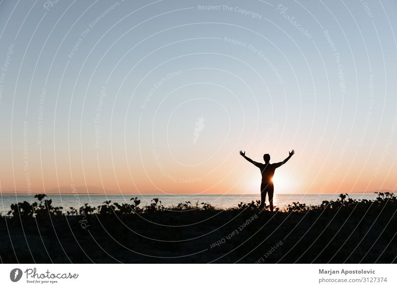Silhouette of a man on the beach Lifestyle Exotic Joy Wellness Harmonious Relaxation Calm Vacation & Travel Tourism Adventure Freedom Summer vacation Beach