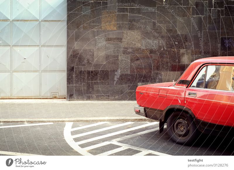 red car Town Capital city House (Residential Structure) Wall (barrier) Wall (building) Facade Street Vehicle Car Retro Trashy Red Gate Parking Budapest