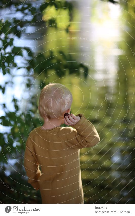 blonde kid playing in nature Parenting Education Kindergarten Child Human being Toddler Boy (child) Family & Relations Infancy Life 1 1 - 3 years 3 - 8 years