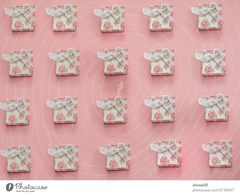 Gift pattern on pink background - a Royalty Free Stock Photo from