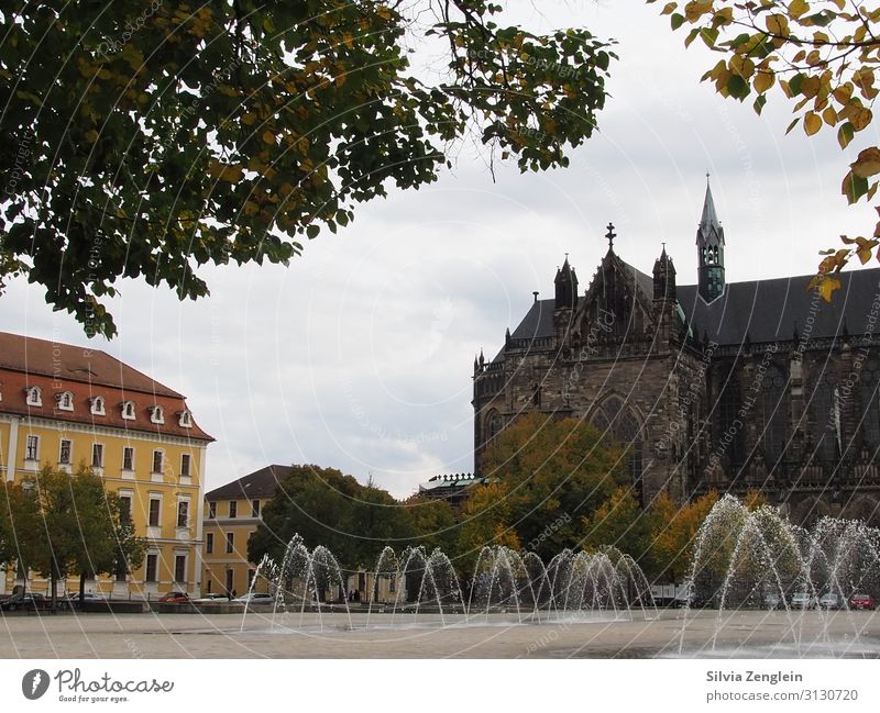 cathedral square Tourism Trip Sightseeing City trip Architecture Water Drops of water Town Capital city Downtown Church Dome Places Fountain Tourist Attraction