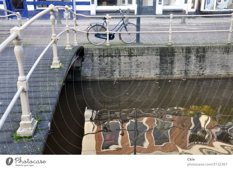 Leeuwarden Trip City trip Cycling Water Sun Autumn Beautiful weather Channel Gracht Netherlands Town Capital city Old town Bridge Wall (barrier) Wall (building)