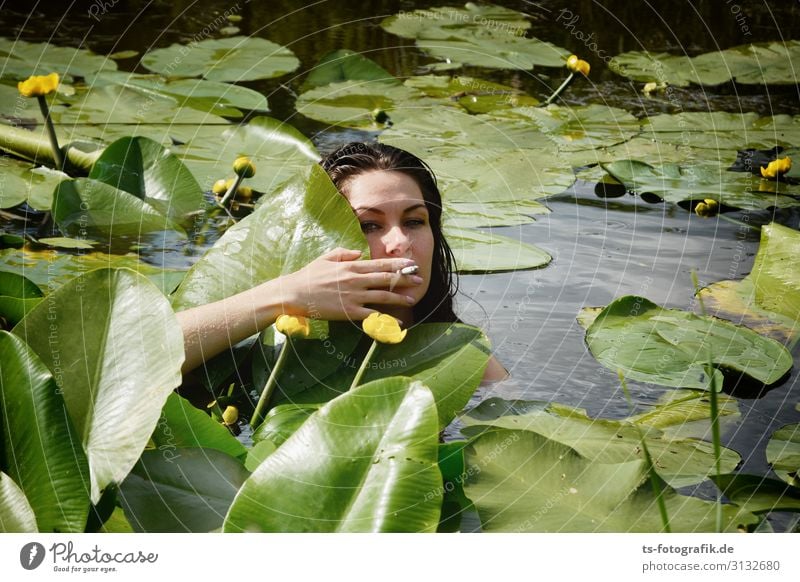Smoke in the Water Human being Feminine Young woman Youth (Young adults) Head Hand 1 18 - 30 years Adults Nature Summer Leaf Blossom Water lily pond roses
