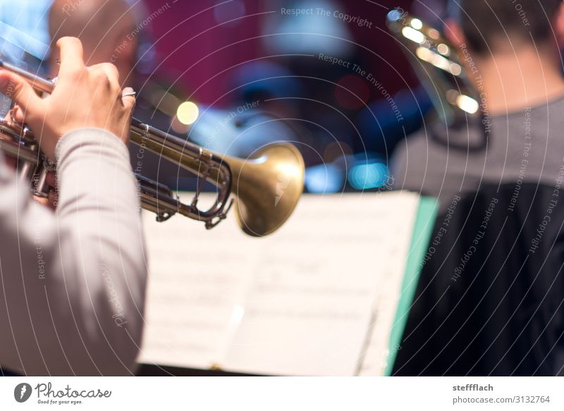 trumpet solo Human being Masculine Arm Hand 3 Music Listen to music Concert Stage Band Musician Orchestra Trumpet Trumpeter Trombone Musical notes Sheet music