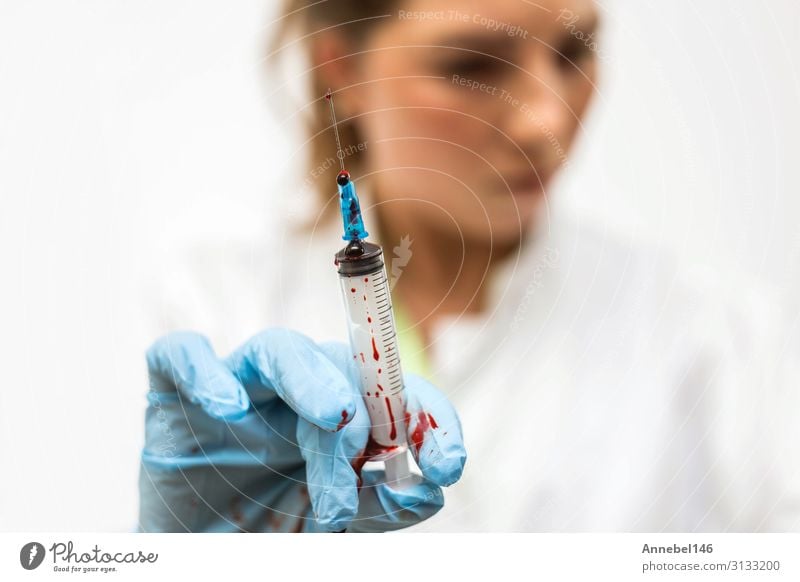 Closeup of nurse's hands with syringe of blood for cure disease Health care Medical treatment Illness Medication Laboratory Examinations and Tests Doctor