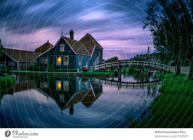 Windy and cloudy sunset in Zaanse Schans Lifestyle Vacation & Travel Tourism City trip Summer vacation House (Residential Structure) Culture Environment Nature