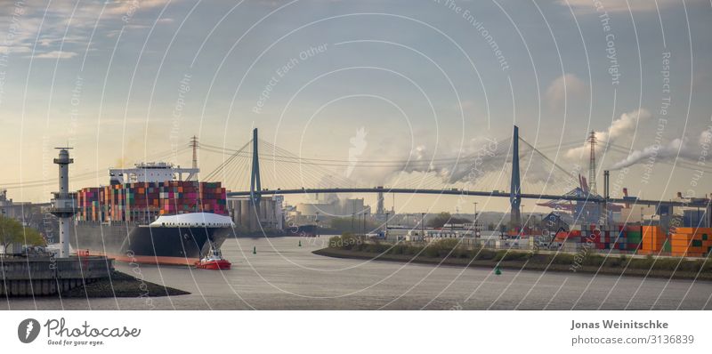 Panorama of a container ship in the morning in the port of Hamburg Water River bank Elbe Town Capital city Port City Populated Tourist Attraction Landmark