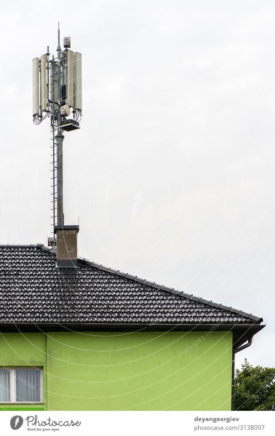 5g Antennas On Top Of House Antennas And Transmitters On Roof A Royalty Free Stock Photo From Photocase