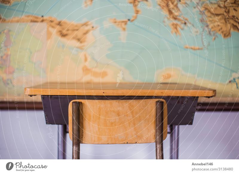 Empty Desks At School Classroom With World Map A Royalty Free